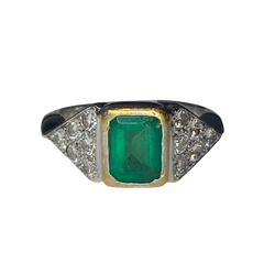 Ring in white gold, yellow gold, emerald, and diamonds