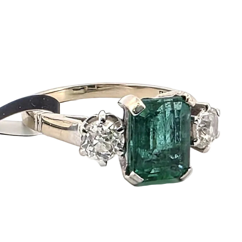 Trilogy Ring in White Gold, Emerald, and Diamonds