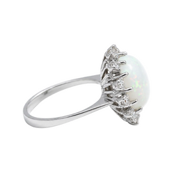 Entourage Ring in white gold, Opal, and Diamonds