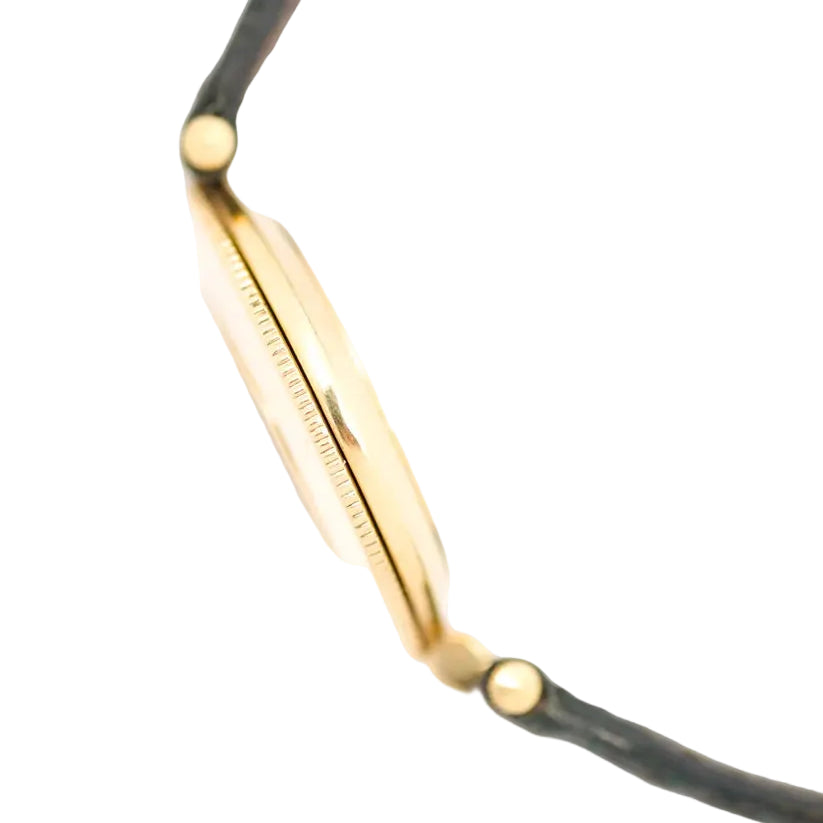 JAEGER-LECOULTRE watch in yellow gold, Mother-of-pearl, leather, emeralds, and diamonds