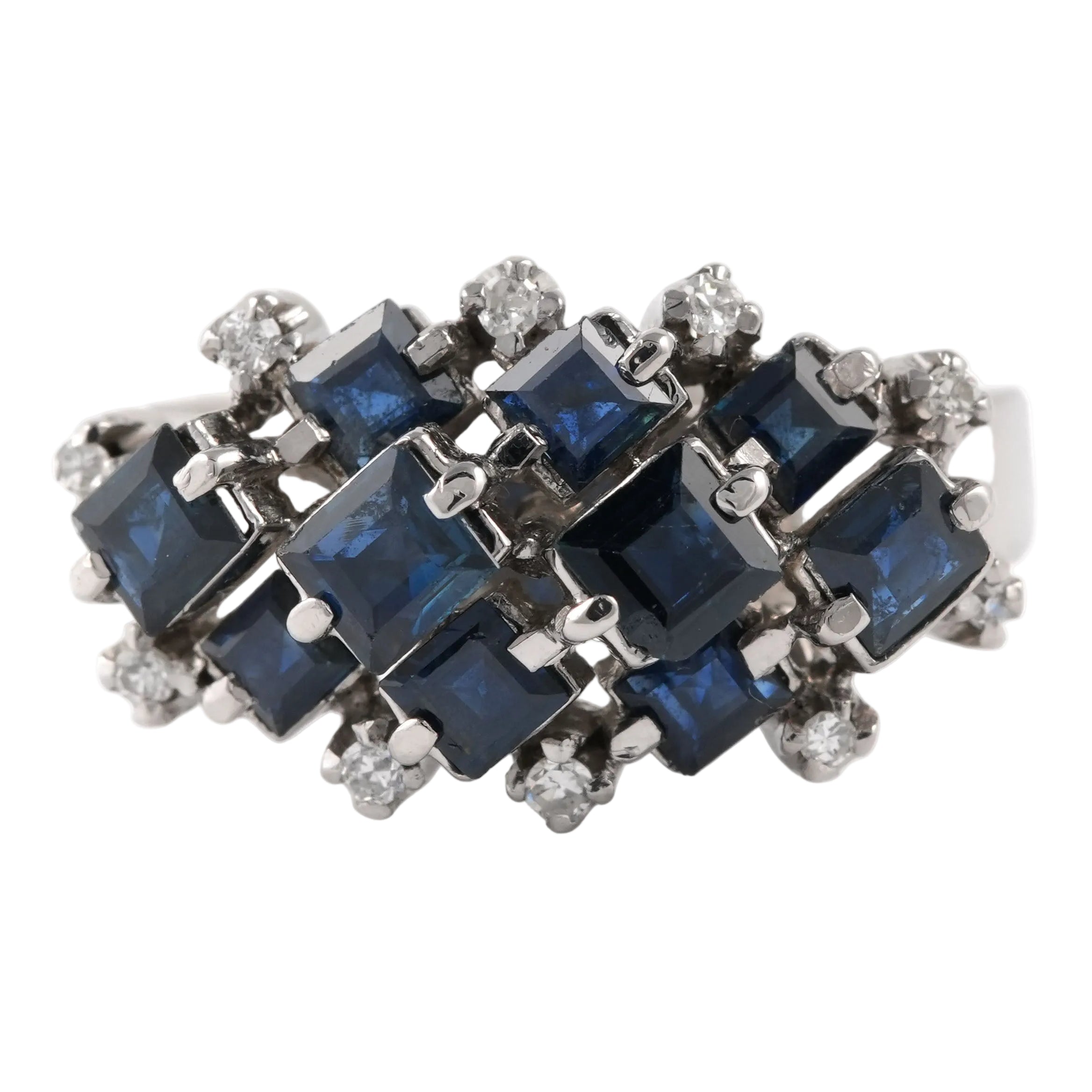White gold ring with sapphires and diamonds