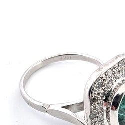 "Entourage" Ring in White Gold, Emerald, and Diamonds