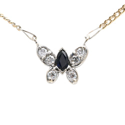 Necklace with a pendant in white gold, yellow gold, sapphire, and diamonds