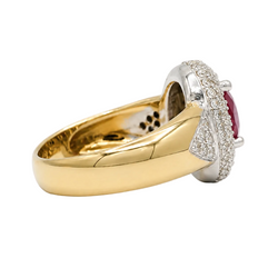 Entourage Ring in white gold, yellow gold, rubies, and diamonds
