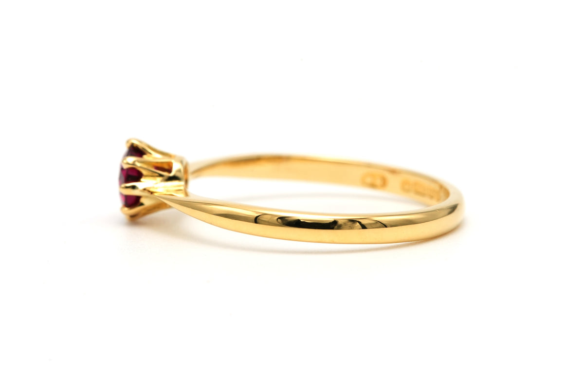 Bague Solitaire en or jaune et grenat