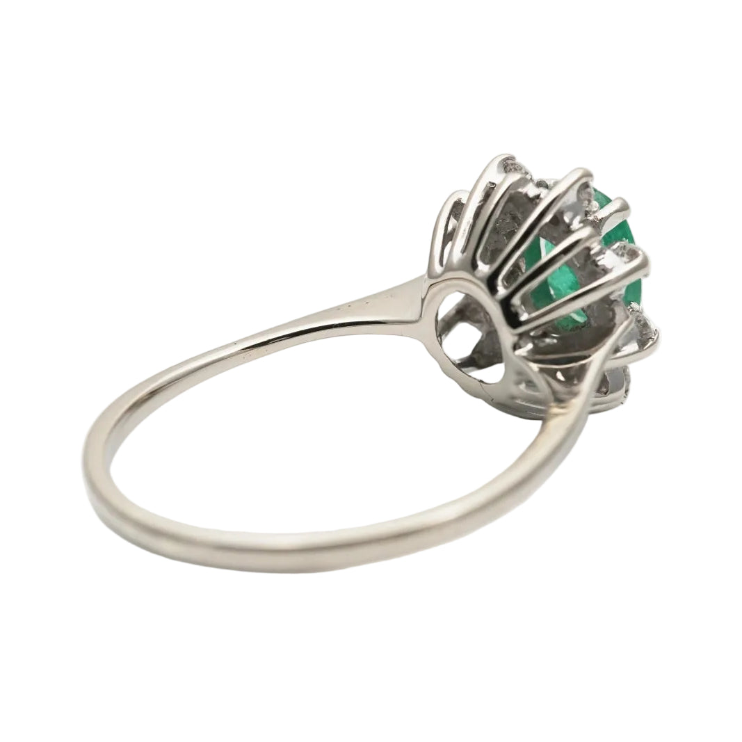 "Entourage" Ring in White Gold, Emerald, and Diamonds