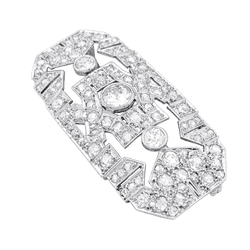 Broche Art Déco en platine, or blanc et diamants.