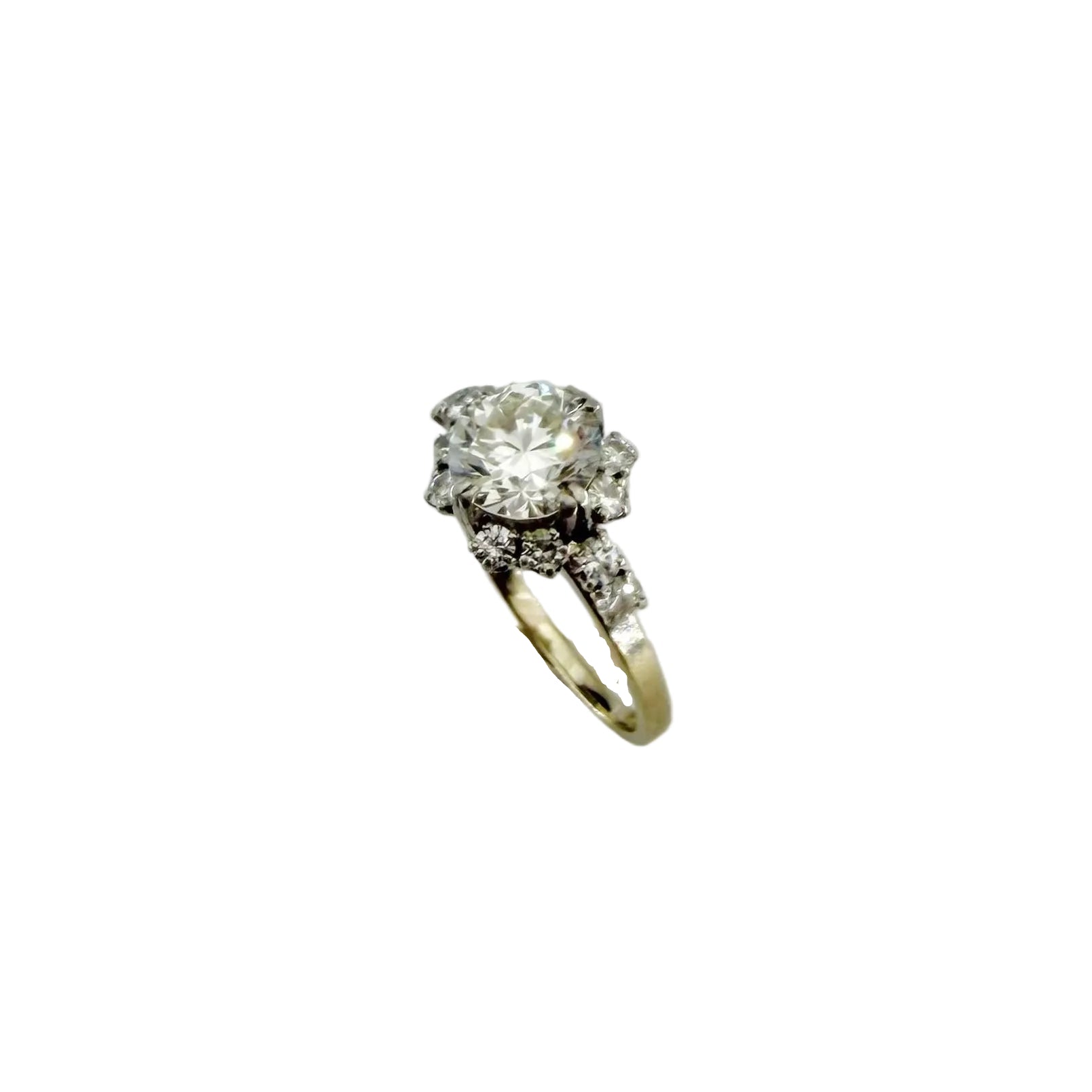 Solitaire Ring in Platinum, White Gold, and Diamonds