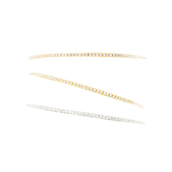 Three bangle bracelets in white gold, yellow gold, rose gold, and diamonds