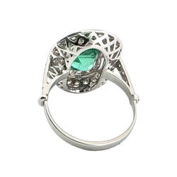 "Entourage" Ring in White Gold, Emerald, and Diamonds