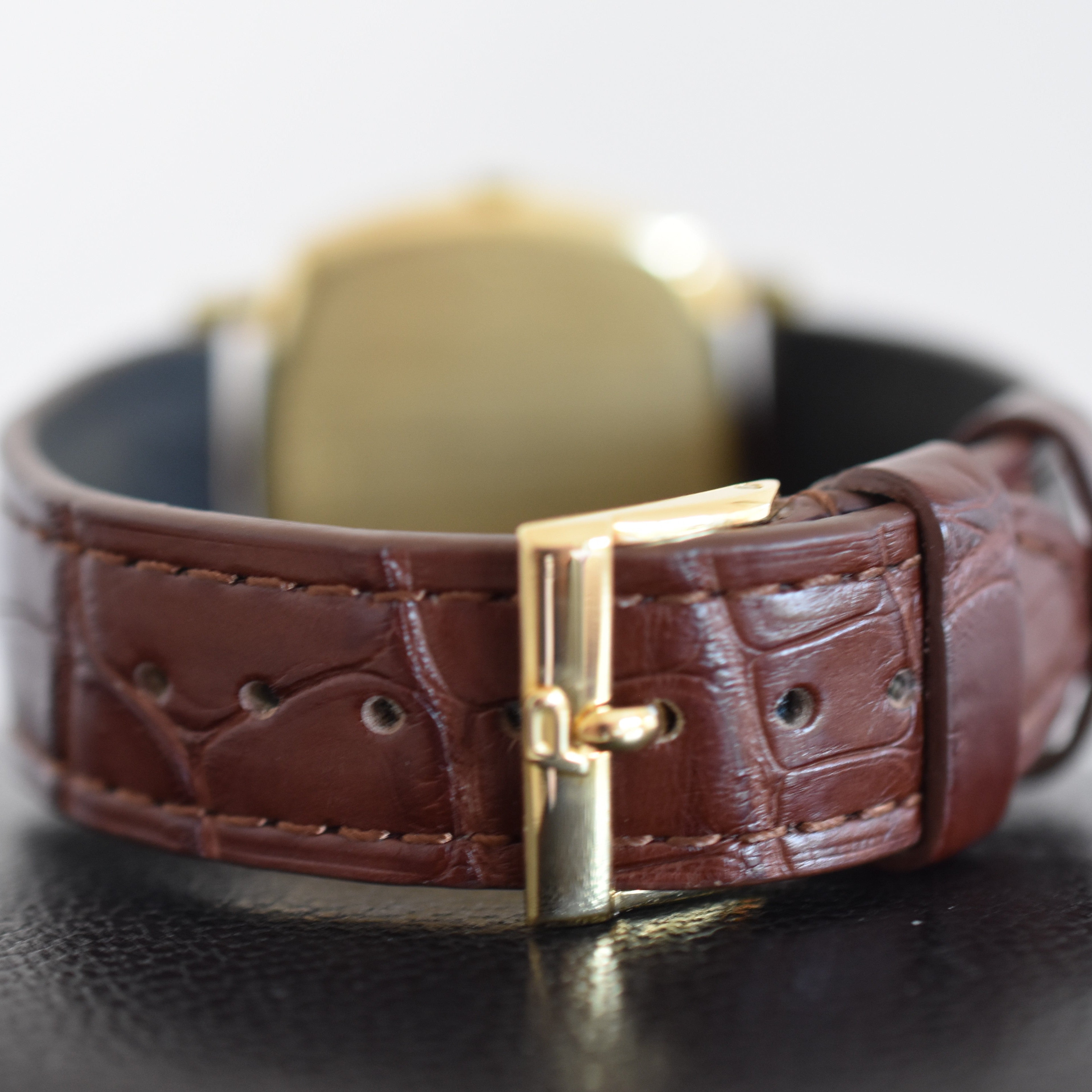 Montre PIAGET Coussin en or jaune et cuir