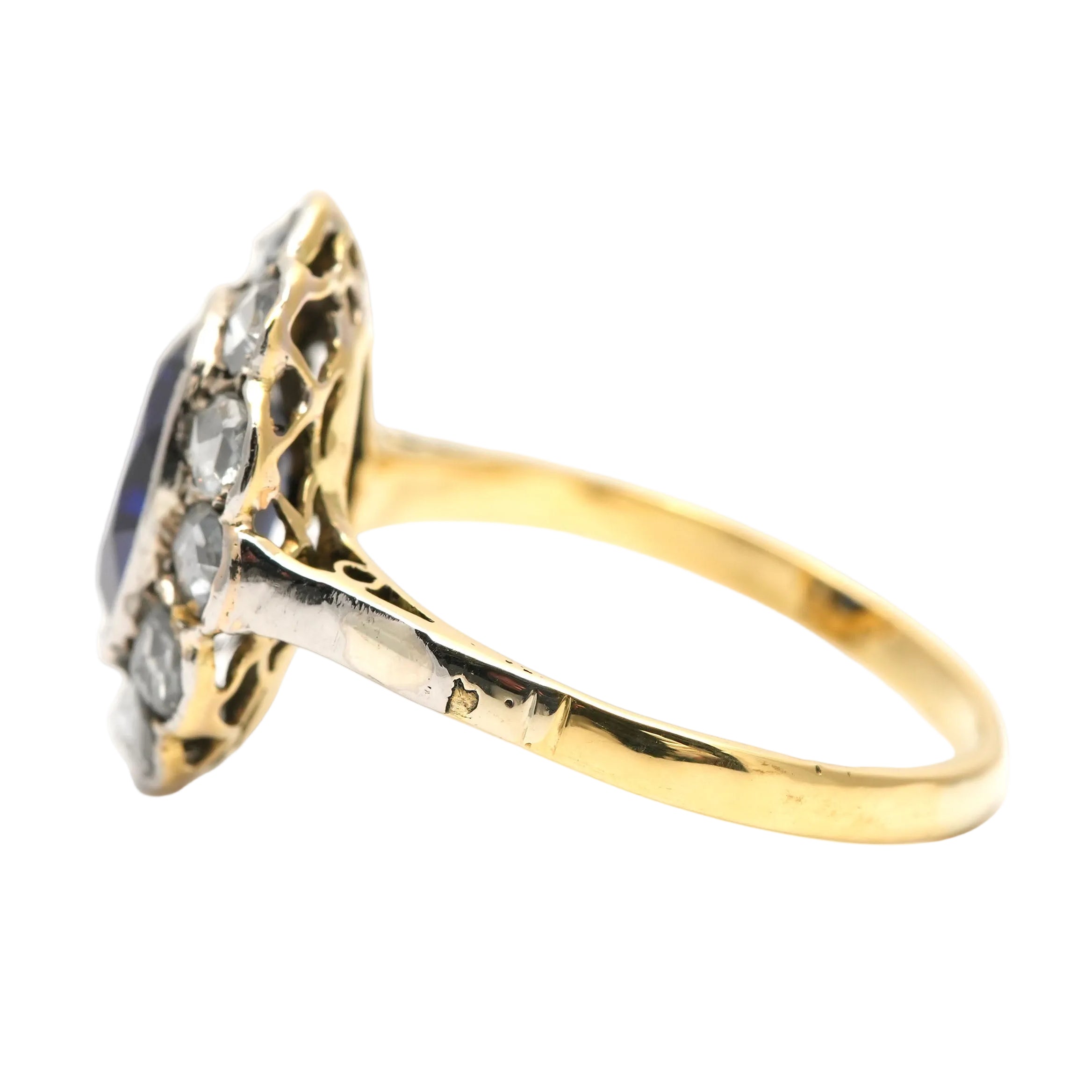 Entourage Ring in white gold, yellow gold, sapphire, and diamonds