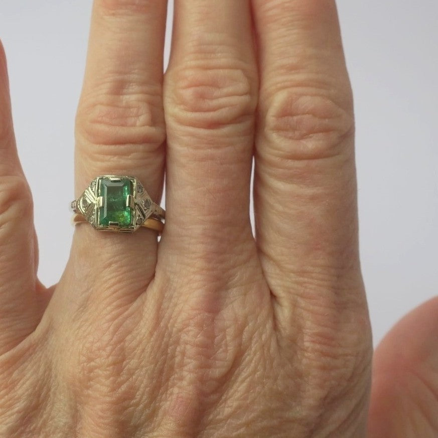 Art Deco ring in white gold, emerald, and diamonds