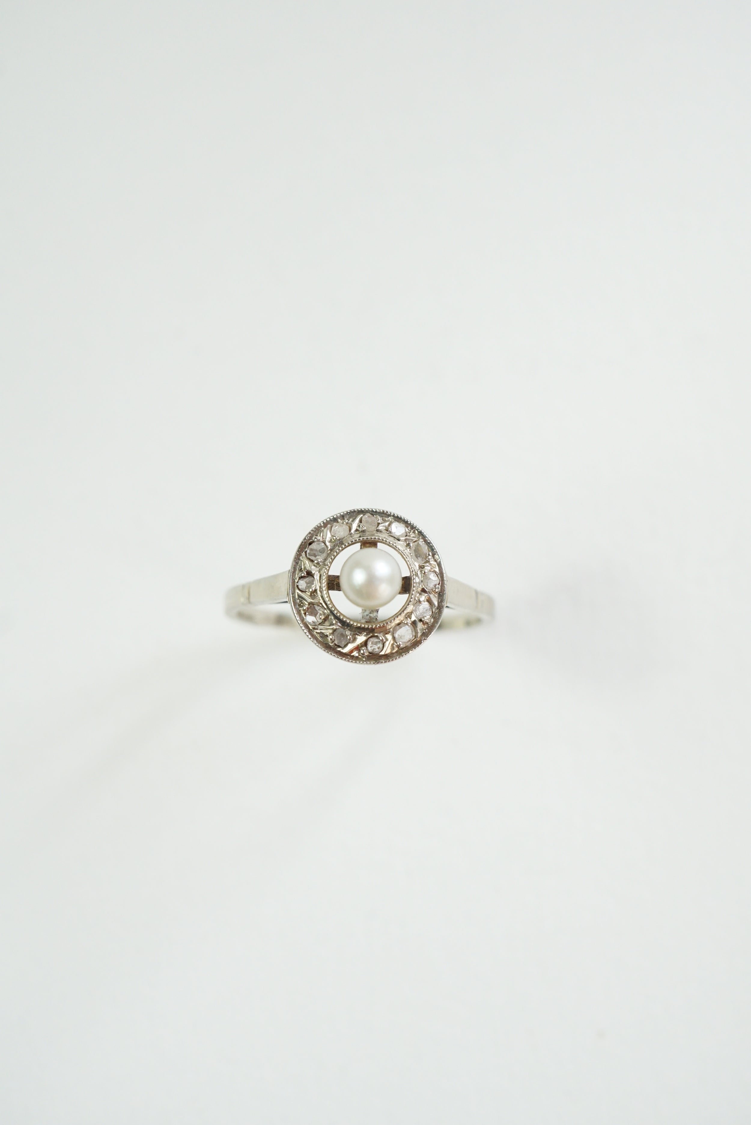 Gold Target Ring with Diamonds and a Pearl
