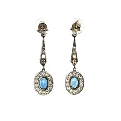 Boucles d'oreilles Pendantes en platine, onyx, saphirs et diamants