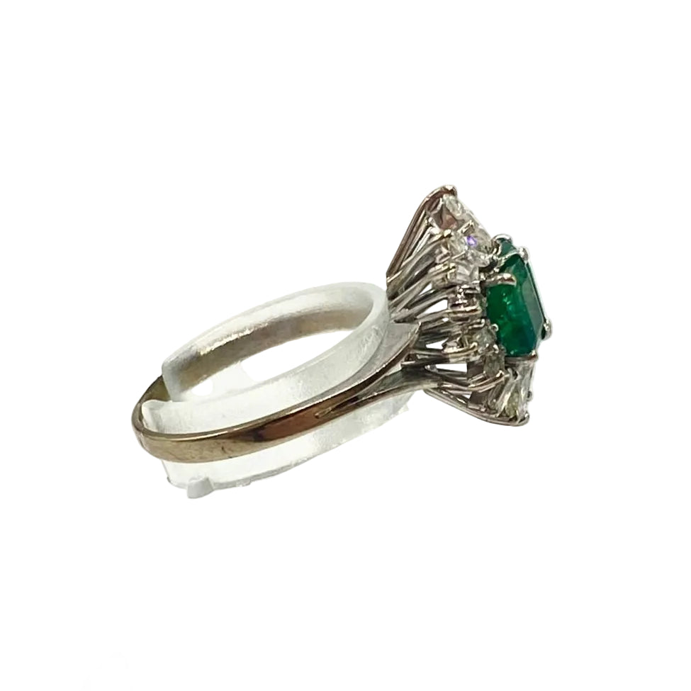 "Entourage" Ring in White Gold, Emeralds, and Diamonds