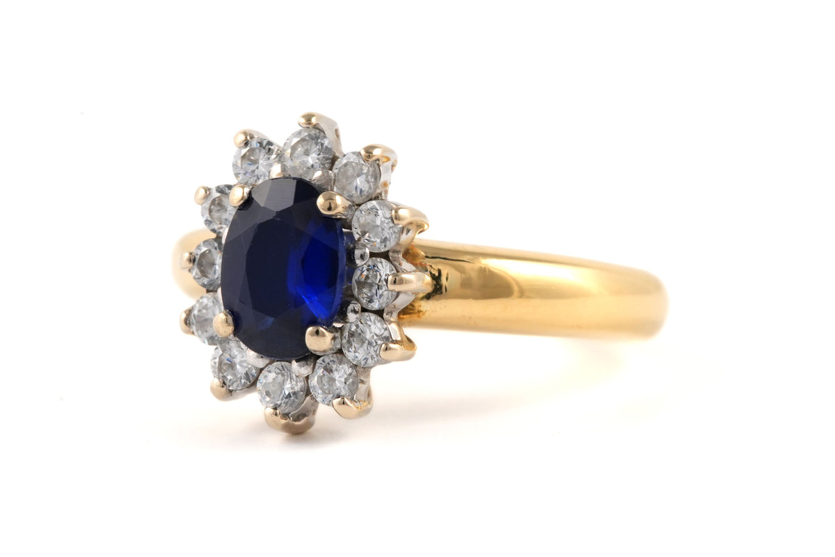 Bague Marguerite en or jaune, saphir et zirconiums