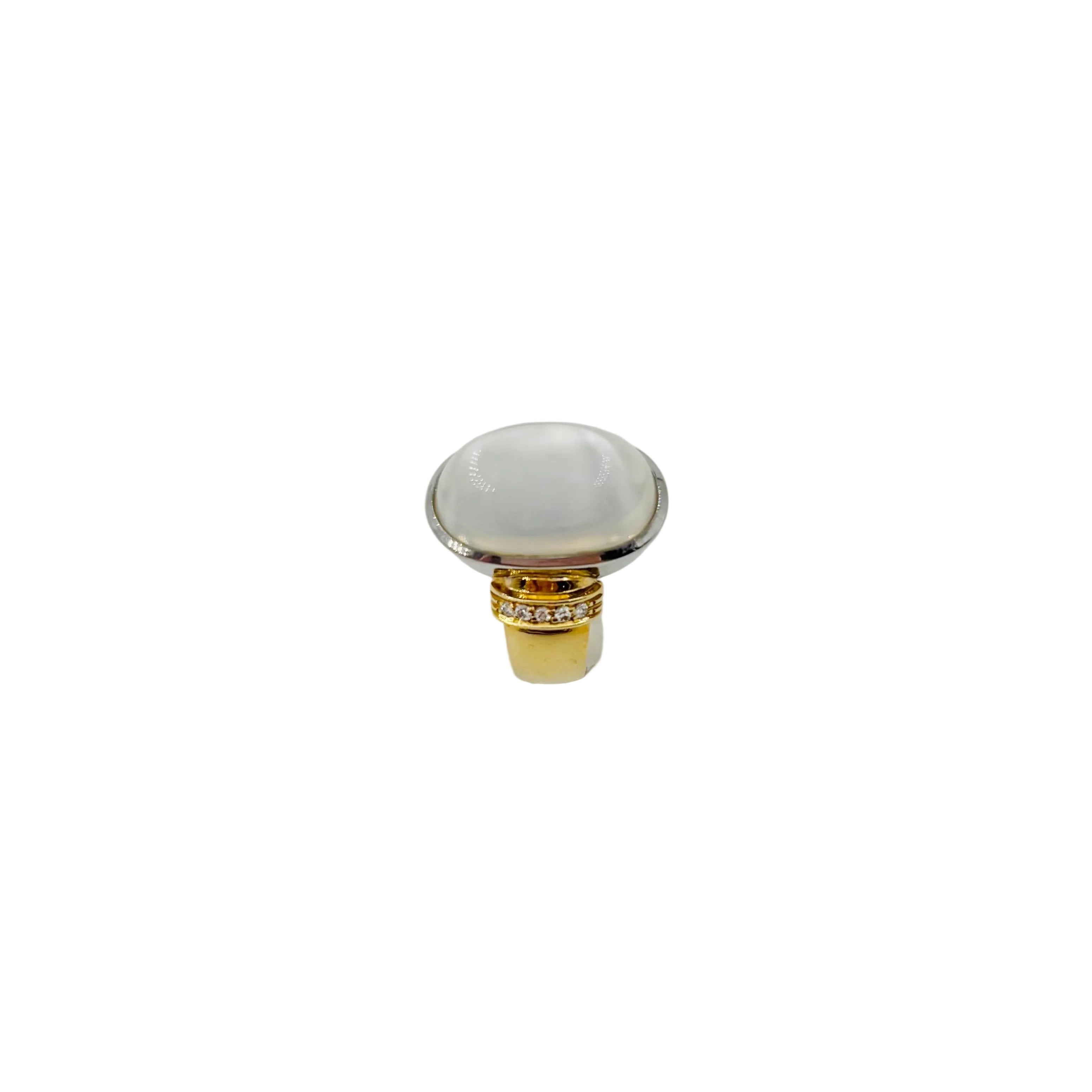 Solitaire Ring in yellow gold, white gold, moonstone, and diamonds