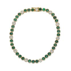 "Ligne" Bracelet in Yellow Gold, Emeralds, and Diamonds