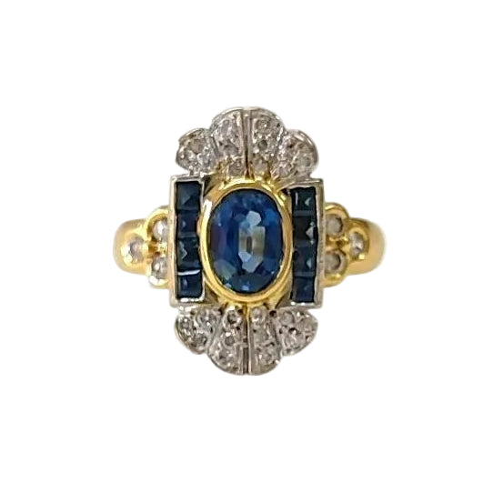 Ring in white gold, yellow gold, sapphires, and diamonds