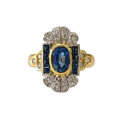 Ring in white gold, yellow gold, sapphires, and diamonds