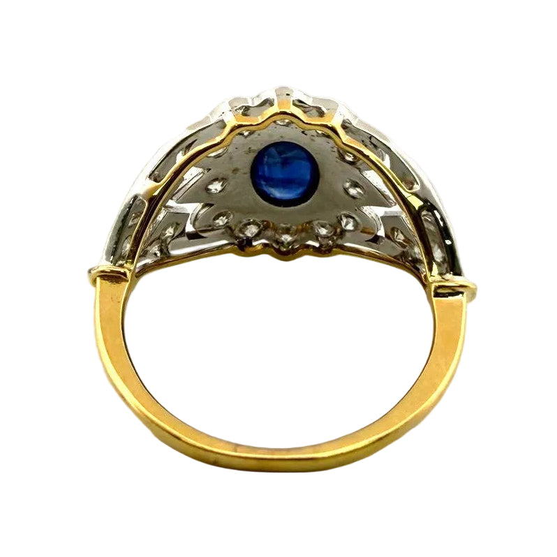 Entourage Ring in white gold, yellow gold, sapphire, and diamonds