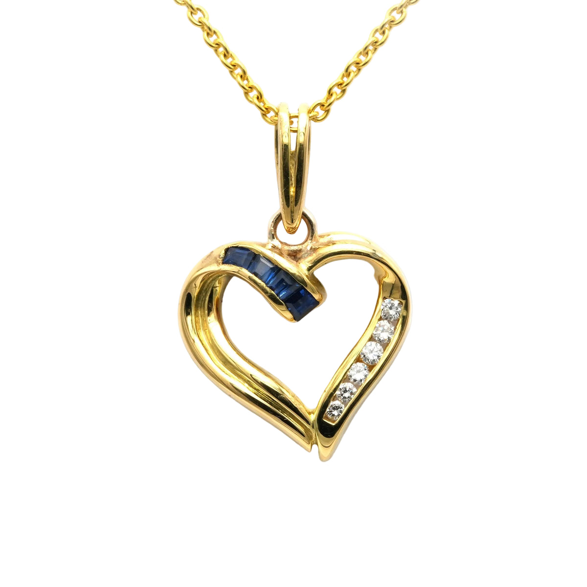 Yellow gold pendant with sapphires and diamonds