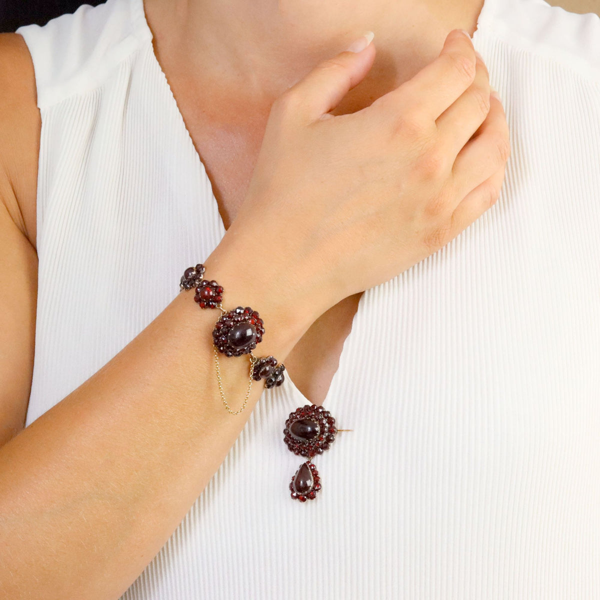 Yellow gold, silver, and garnet bracelet