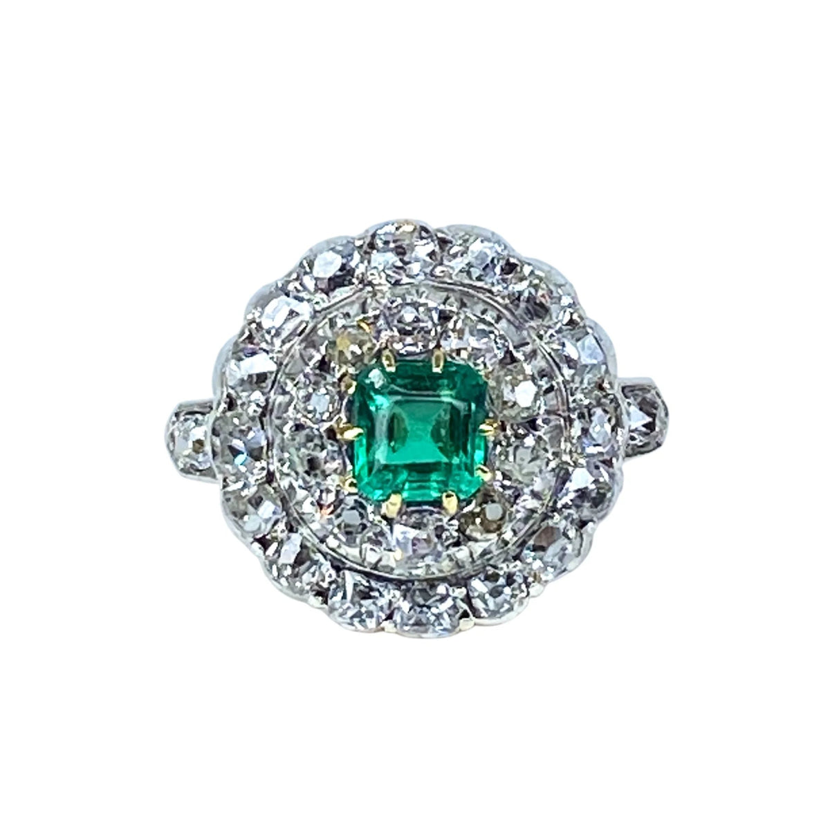 Marguerite Ring in white gold, yellow gold, emeralds, and diamonds