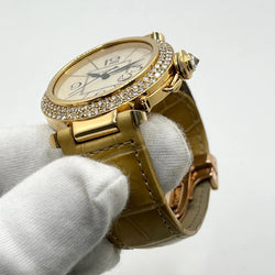 Montre CARTIER Pasha en or jaune, or rose, cuir et diamants