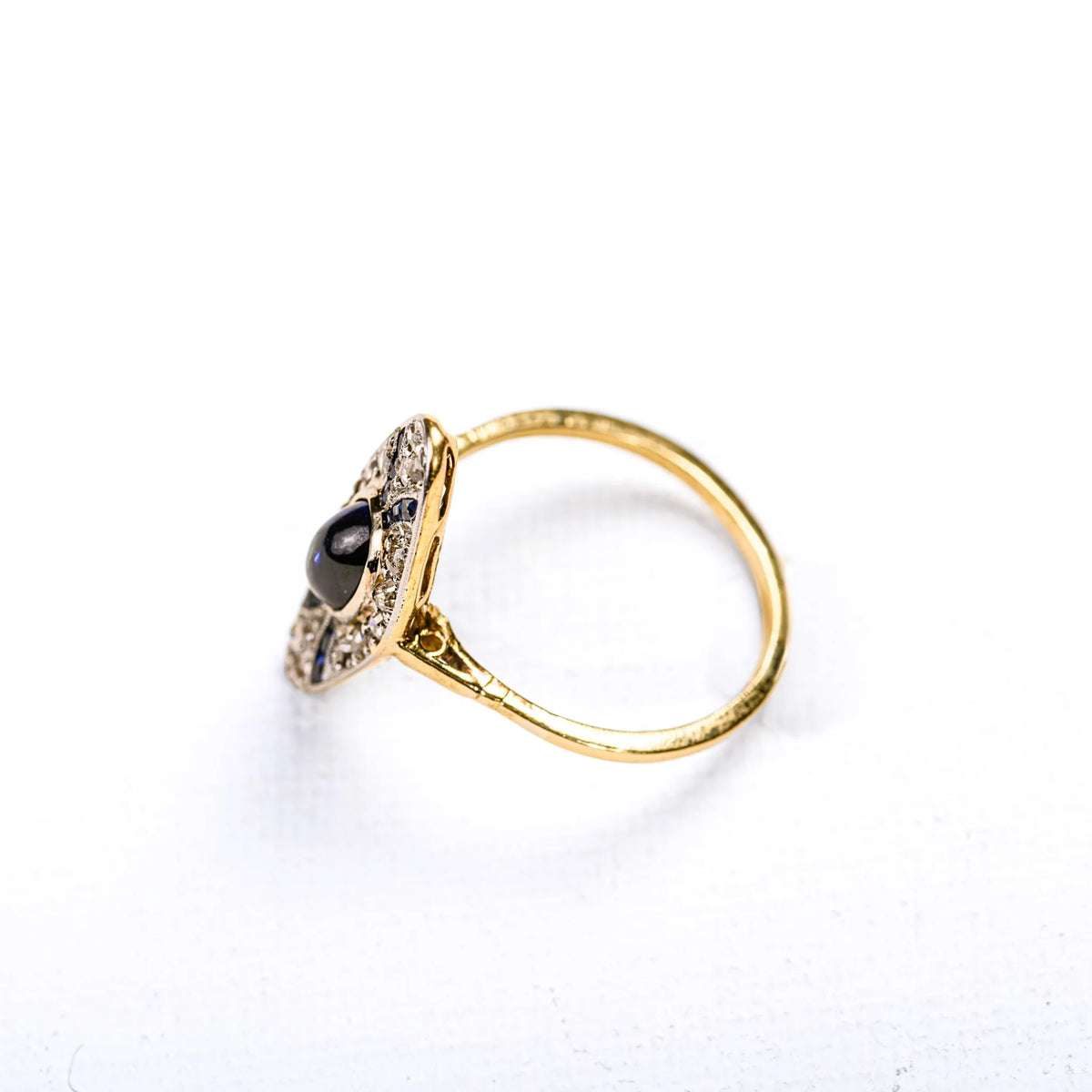Art Deco marquise ring in multicolored gold, synthetic sapphires, and diamonds