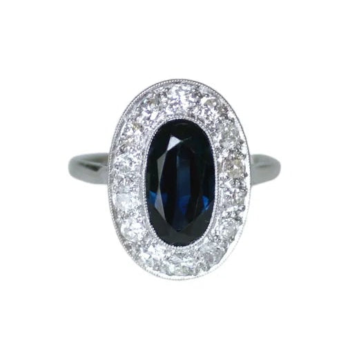 Entourage Ring in Platinum, Sapphire, and Diamonds