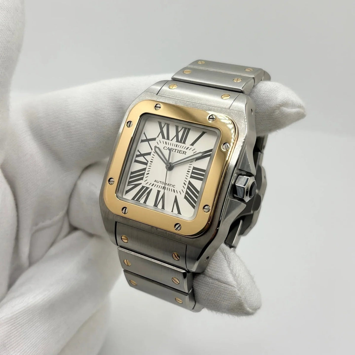 Montre CARTIER Santos 100 en or jaune et acier inoxydable