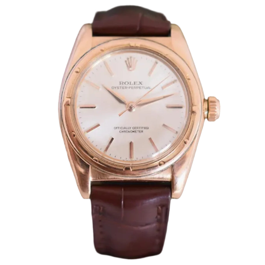 ROLEX "Perpetual Ovetto Bubbleback" watch in rose gold and leather