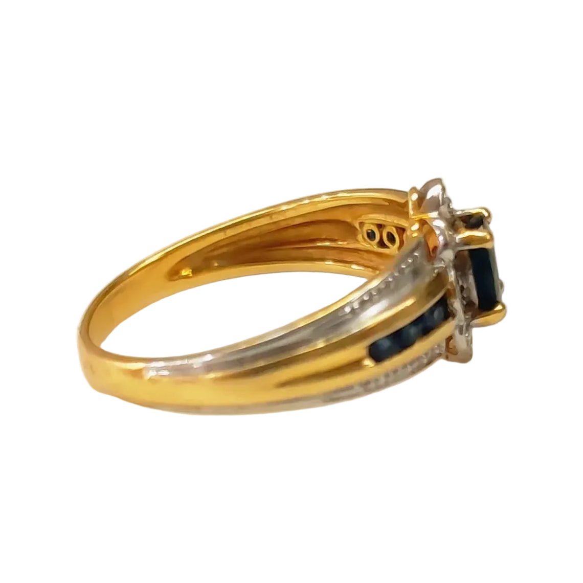 Bangle ring in white gold, yellow gold, sapphire, and diamonds