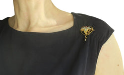 Art Nouveau Brooch Pendant with Rubies, Diamonds, and a Fine Pearl in 18-carat Rose Gold and Platinum