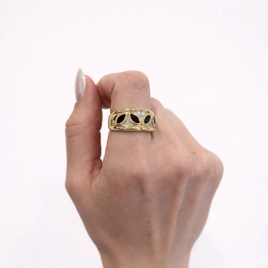 Band Ring in white gold, yellow gold, sapphires, and diamonds