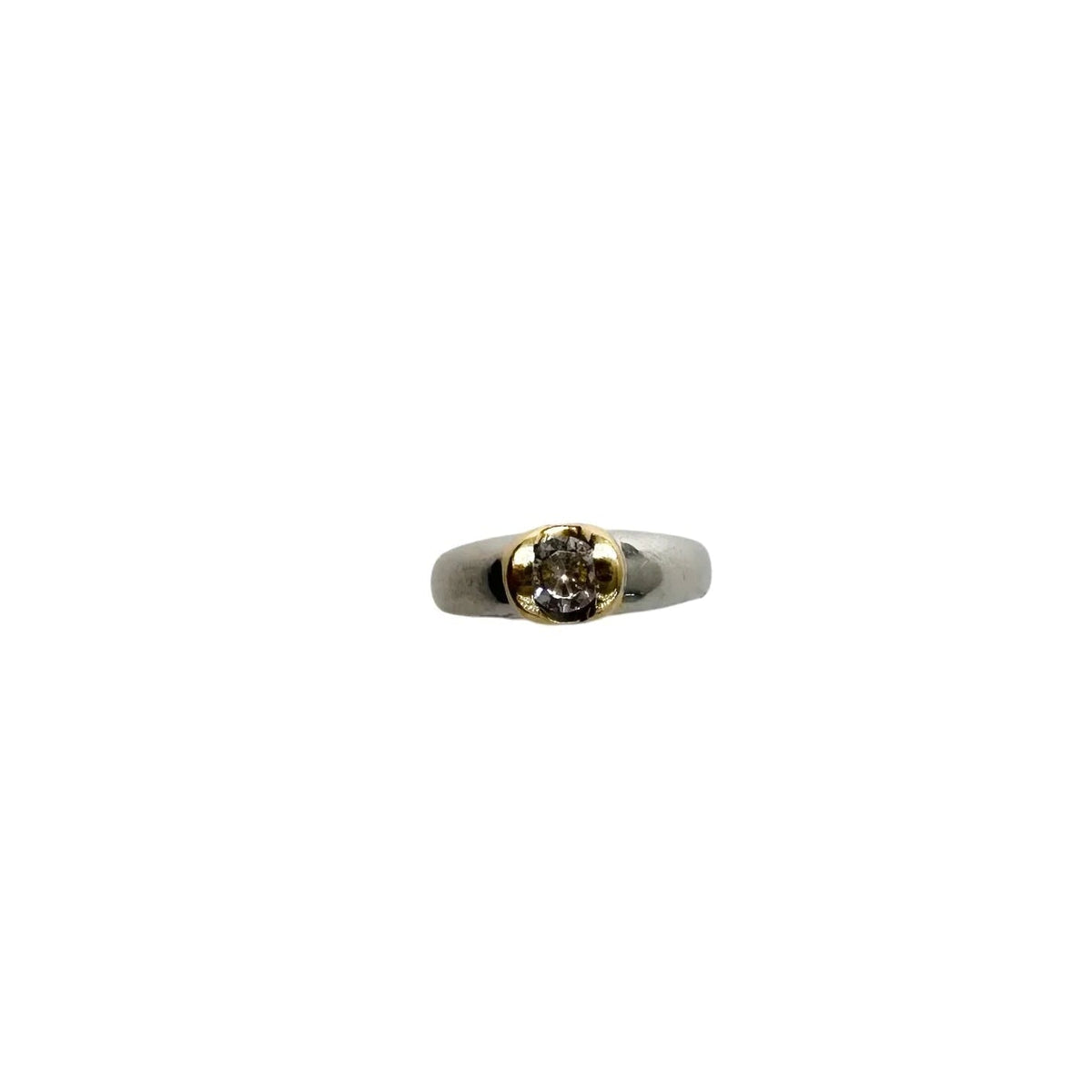 Solitaire Ring in White gold, Yellow gold, and Diamond