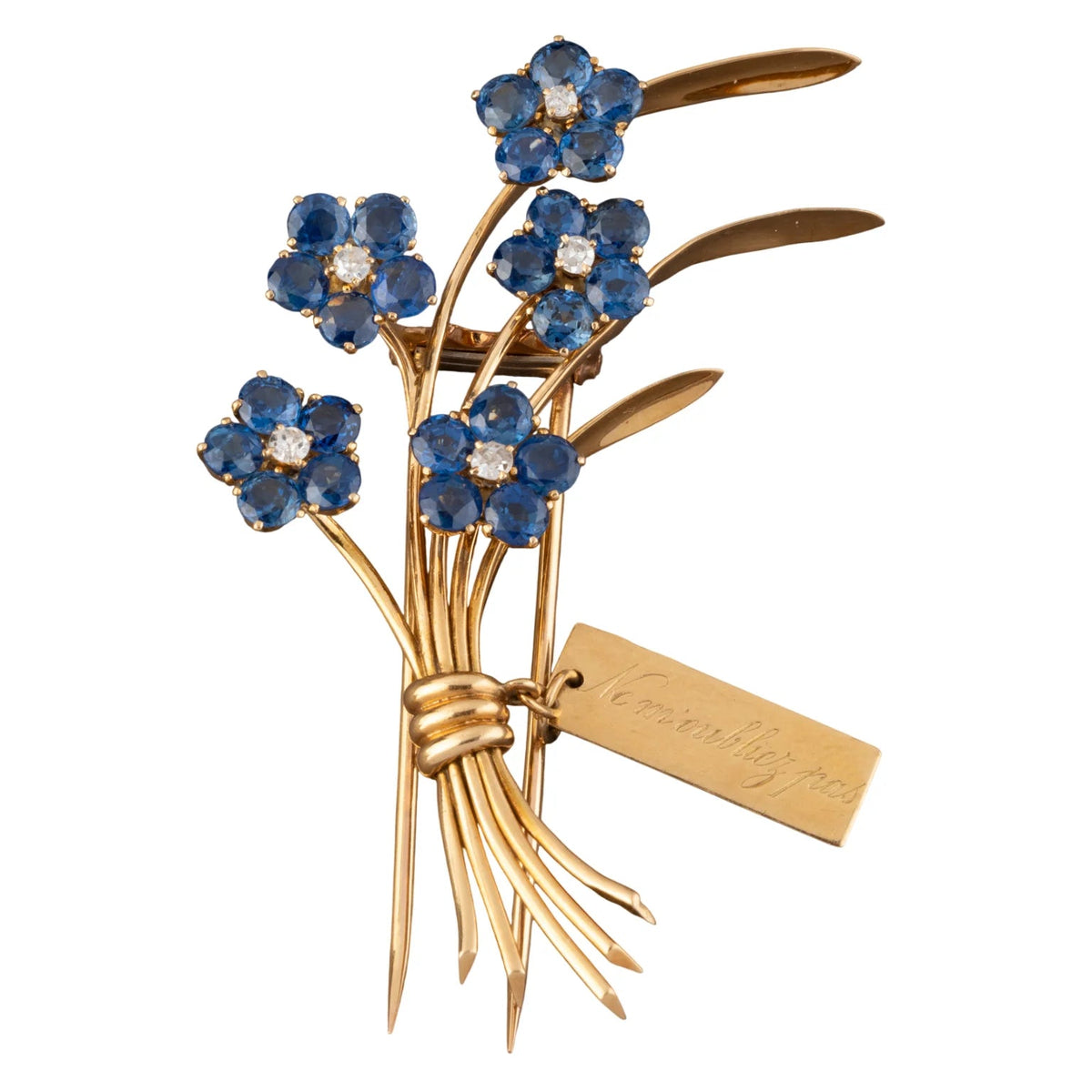 VAN CLEEF & ARPELS "Ne m'oubliez pas" Clip Brooch in yellow gold, sapphires, and diamonds