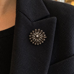 Brooch made of yellow gold, silver, and diamonds