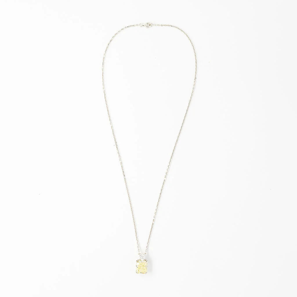 White Gold Necklace with a Pendant Featuring a Fancy Yellow Diamond and a Diamond