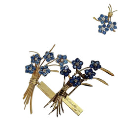 VAN CLEEF & ARPELS "Ne m'oubliez pas" Clip Brooch in yellow gold, sapphires, and diamonds
