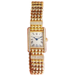 CARTIER "Tank Louis Cartier Mini" watch in yellow gold and diamonds