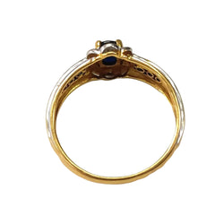 Bangle ring in white gold, yellow gold, sapphire, and diamonds