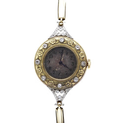 Watch in yellow gold, platinum, and diamonds