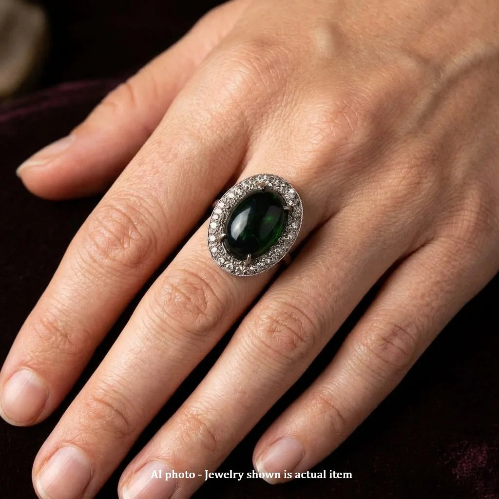 Entourage Ring in white gold, Opal, and Diamonds