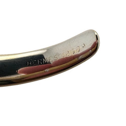 HERMÈS bangle in white gold, yellow gold, and diamonds