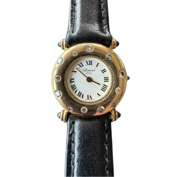 CHOPARD "Classic" Watch in yellow gold, leather, Sapphire, and Diamonds