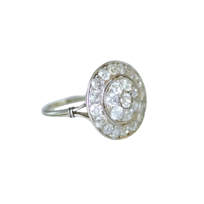 Entourage Ring in white gold, Platinum, and Diamonds
