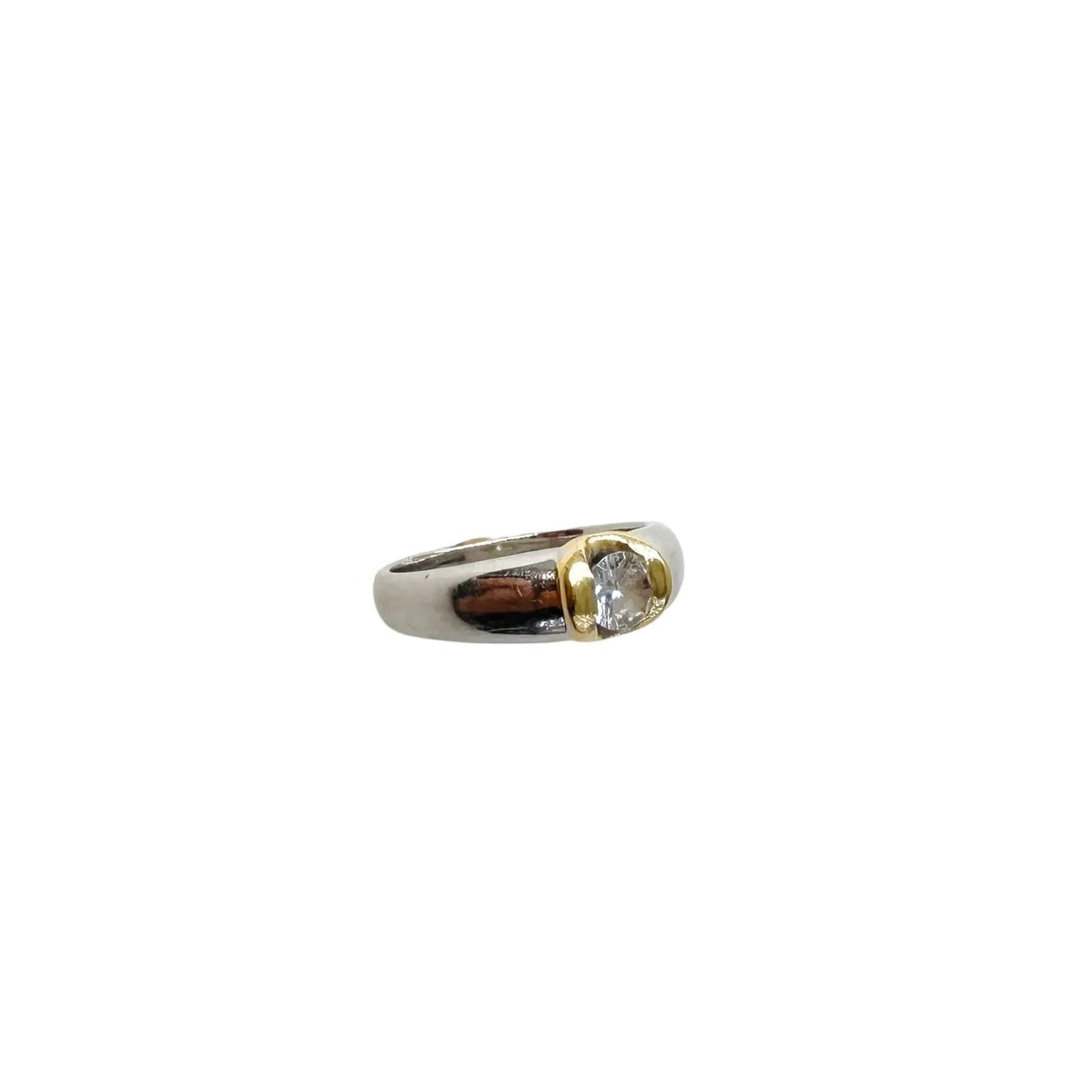 Solitaire Ring in White gold, Yellow gold, and Diamond